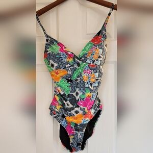 Into the Bleu ladies one piece bathing suit. Size 10